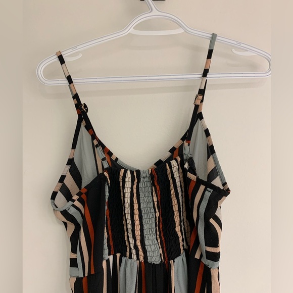 Stripped romper with adjustable straps. - Picture 5 of 6